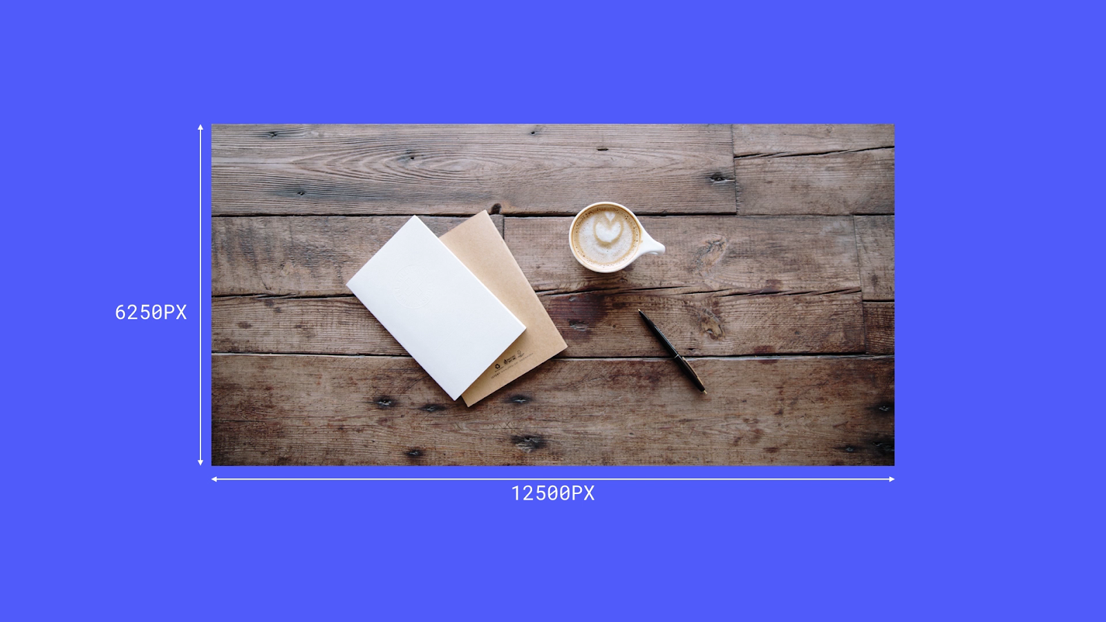 An example of a 6250 px x 12500 px image, which shows a notebook, pen, and coffee on a wooden table.